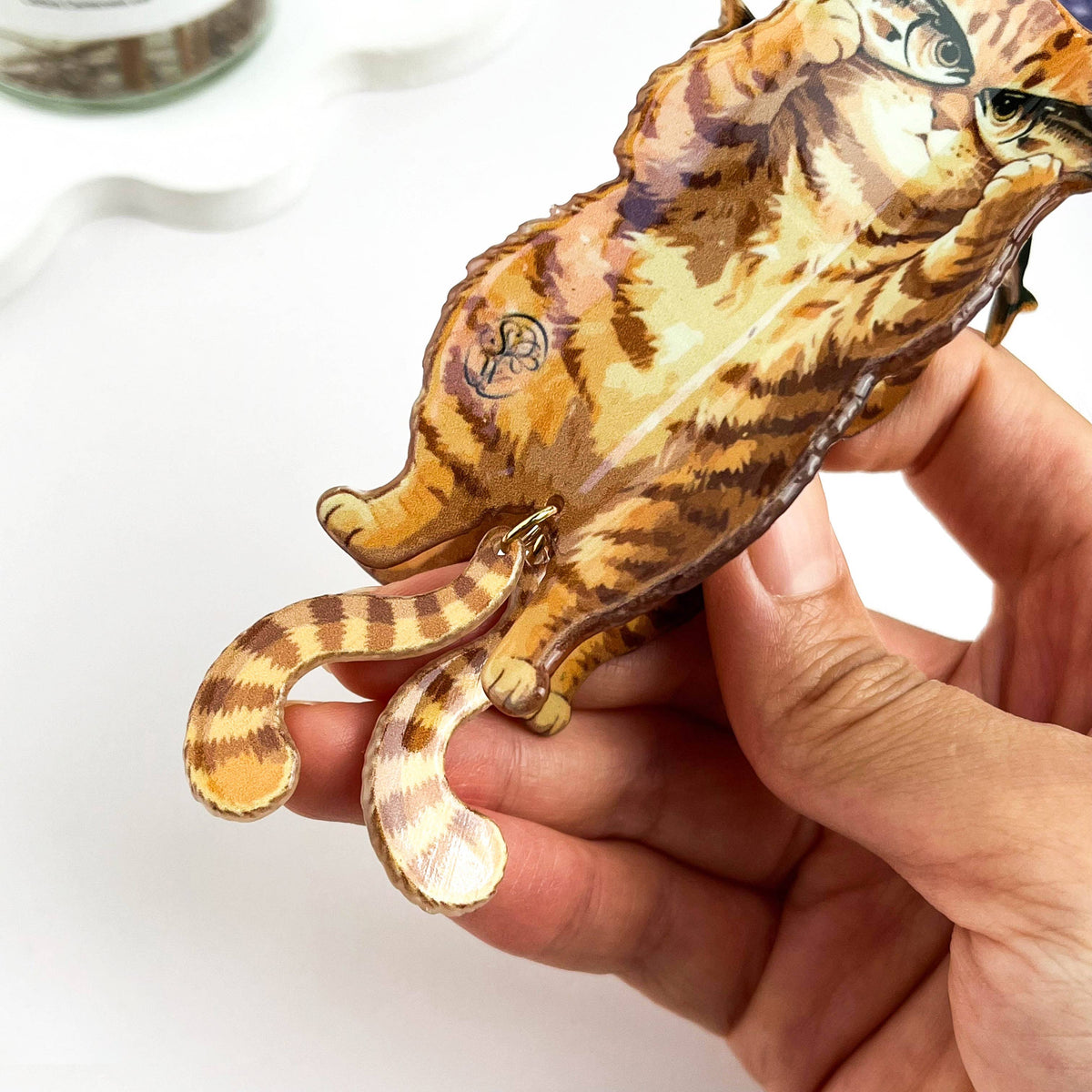 Tabby Cat With Fish Clip